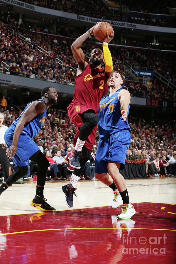 Kyrie Irving and Klay Thompson Photograph by David Sherman