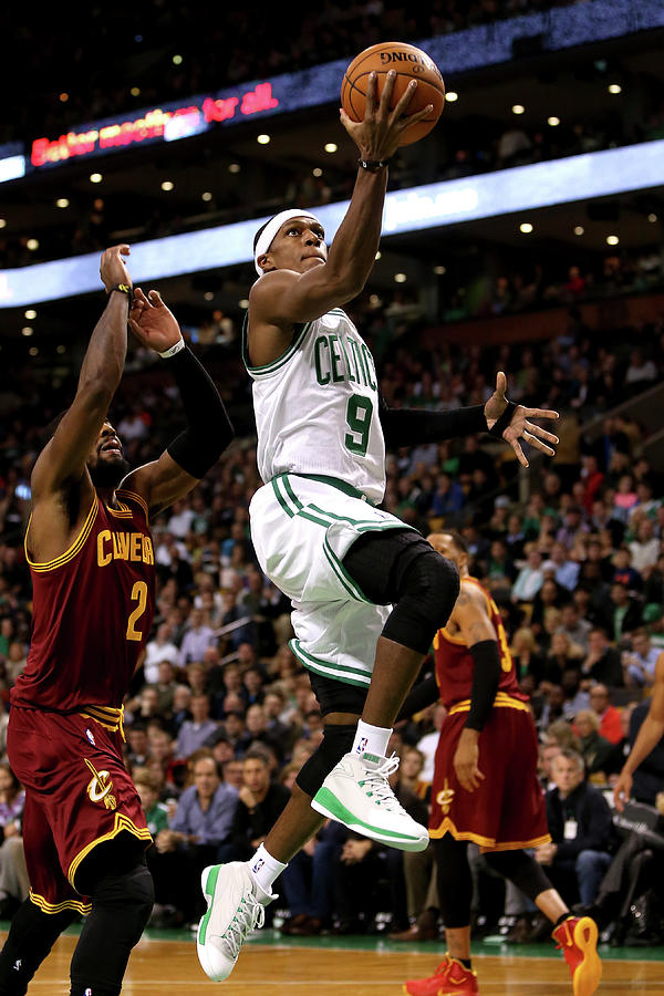 Kyrie Irving and Rajon Rondo Photograph by Mike Lawrie