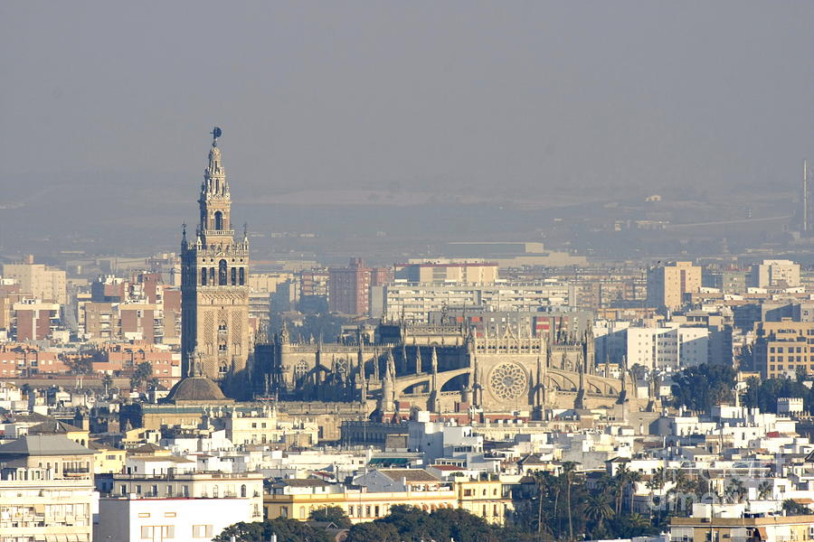 La Giralda and Catedral de Sevilla from a Distant Cloud Photograph by Tony Lee