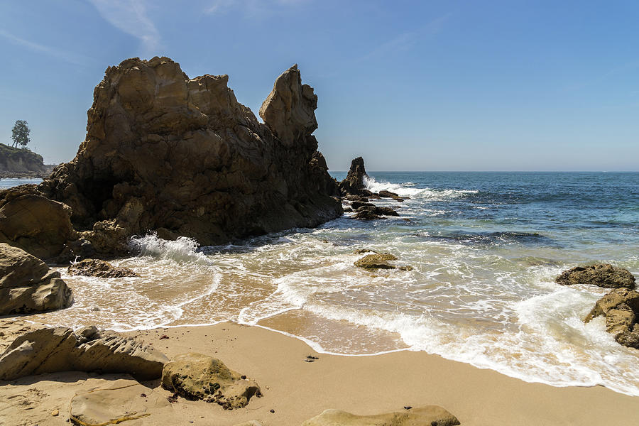 Lacy Foam and Jagged Rocks - Corona Del Mar Beach in Orange County California CA USA Photograph by Georgia Mizuleva
