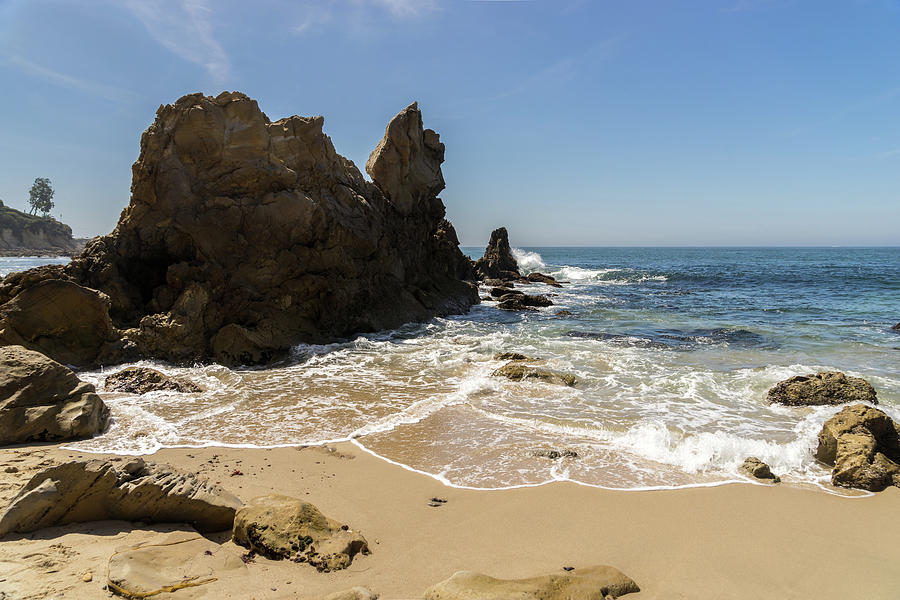 Lacy Seafoam and Jagged Rocks - Corona Del Mar Beach Orange County California Photograph by Georgia Mizuleva