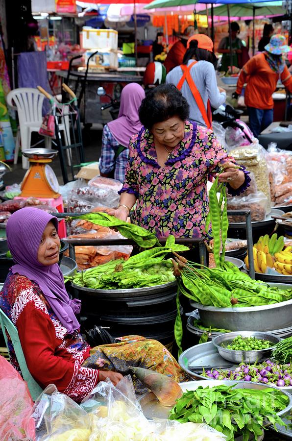 Lady Examines Vegetables As Fresh Food Market Bazaar  In Hatyai Thailand Photograph