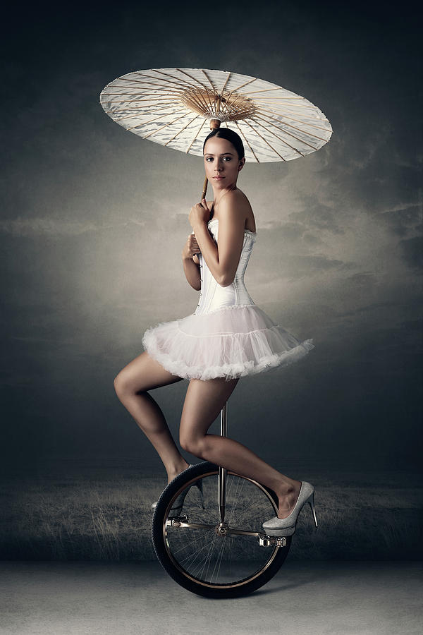 Fantasy Photograph - Lady on a unicycle by Johan Swanepoel