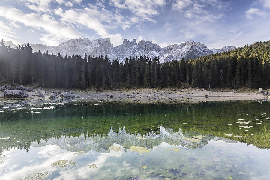 Lago di Carezza and the Latemar mountain range Photograph by Julian Elliott Photography