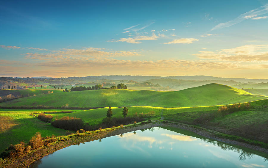 Lake and rolling hills. Castelfiorentino, Tuscany Photograph by Stefano Orazzini