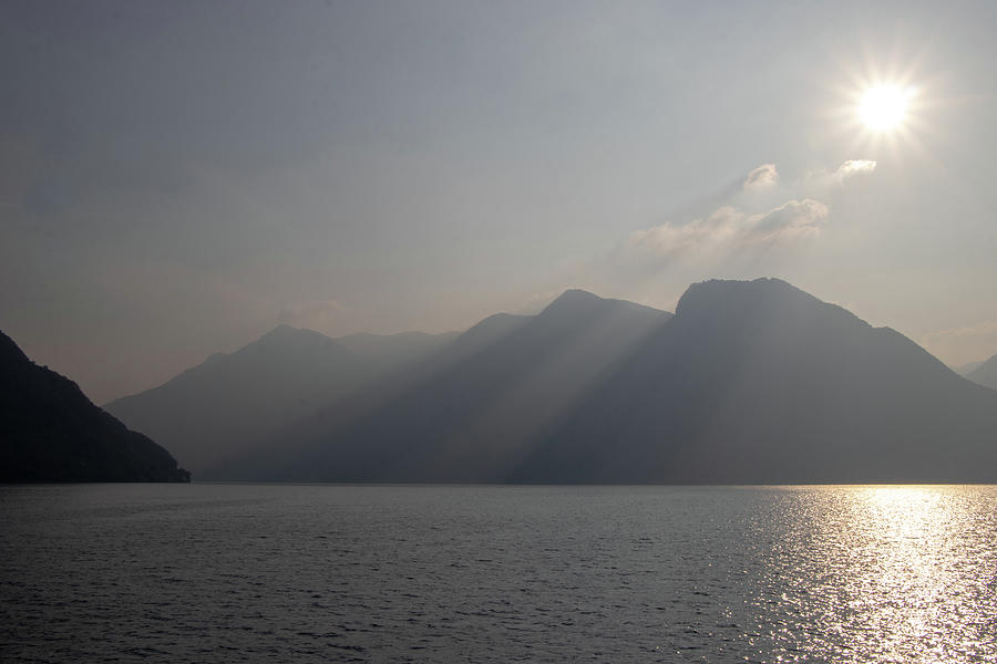 Lake Como beams Photograph by Avenue Des Images