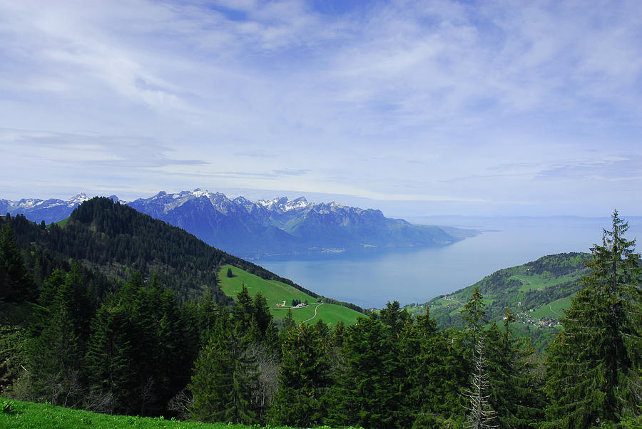 Lake geneva with mountains in foreground Photograph by Lyn Holly Coorg