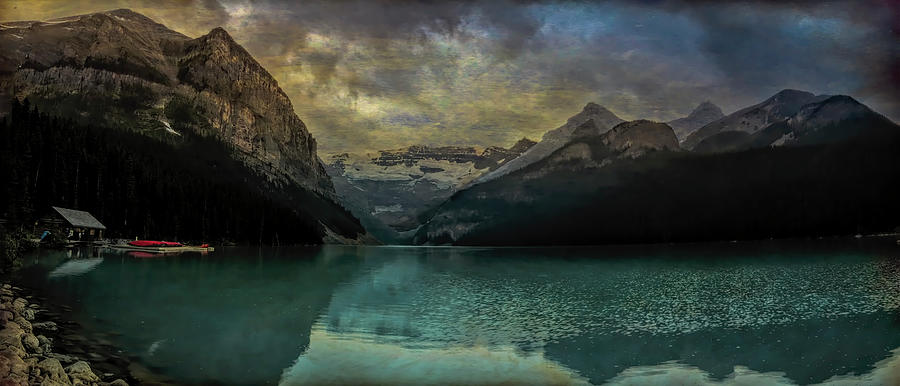 Lake Louise Canoes Reflections Photograph by Norma Brandsberg