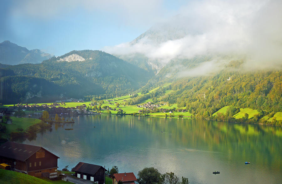 Lake Lungern scenery in early morning sun in autumn. Photograph by Rosmarie Wirz