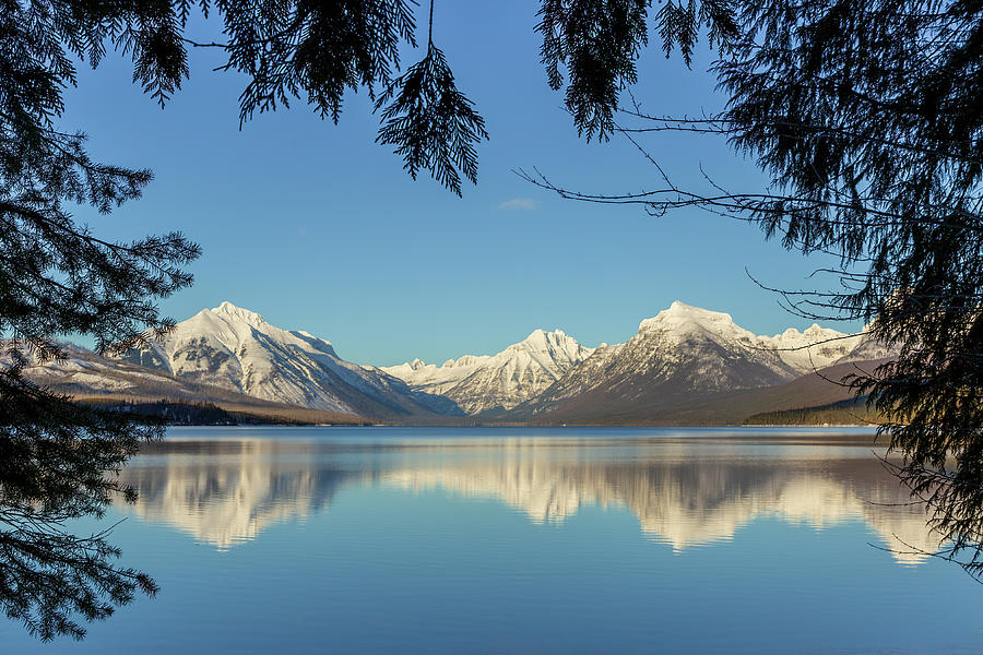Lake McDonald Framed by Trees Photograph by Jack Bell
