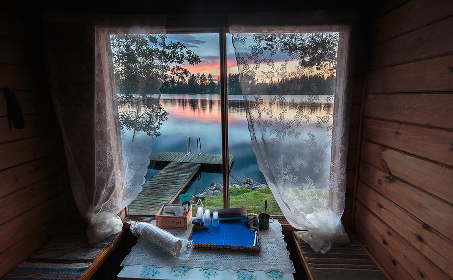 Lake seen from a traditional sauna window Photograph by Samuli Vainionpää