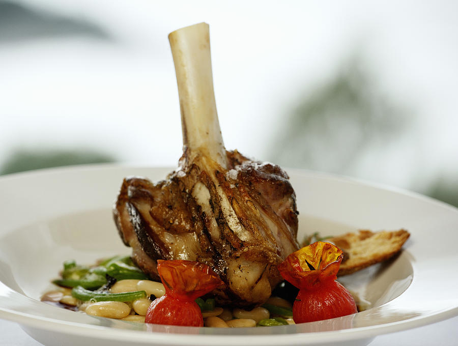 Lamb shank with favo beans and gravy Photograph by Vegar Abelsnes Photography