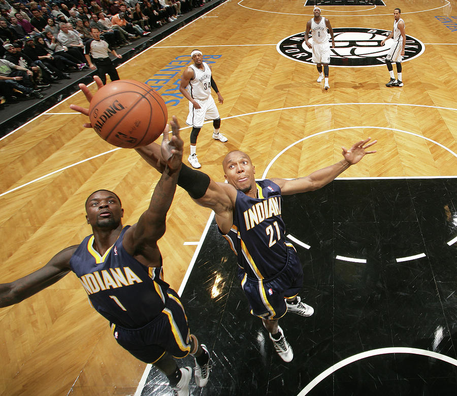 Lance Stephenson and David West Photograph by Nathaniel S. Butler Lance Stephenson and David West Photograph by Nathaniel S. Butler