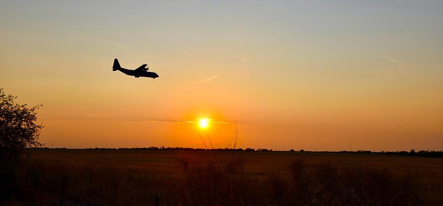 Abilene Photograph - Landing at Sunset by Glen McGraw
