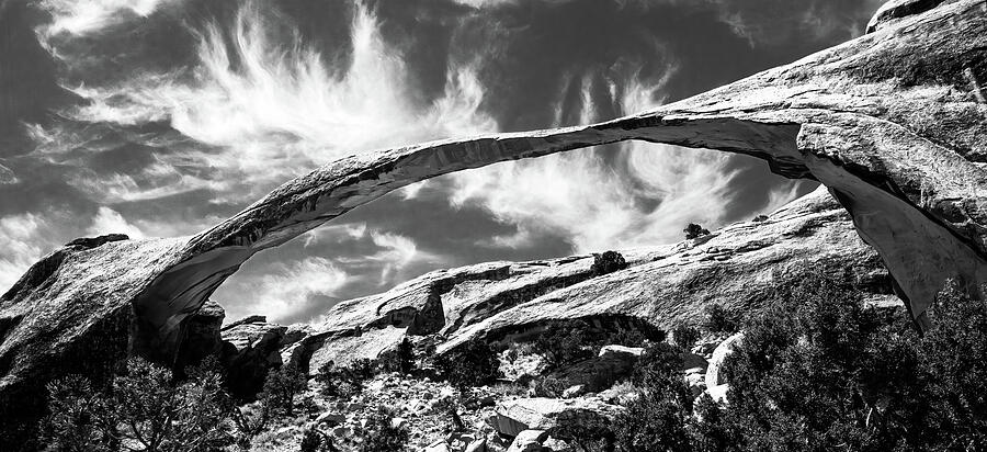 Landscape arch in arches national park, black and white Photograph by Jean-Luc Farges
