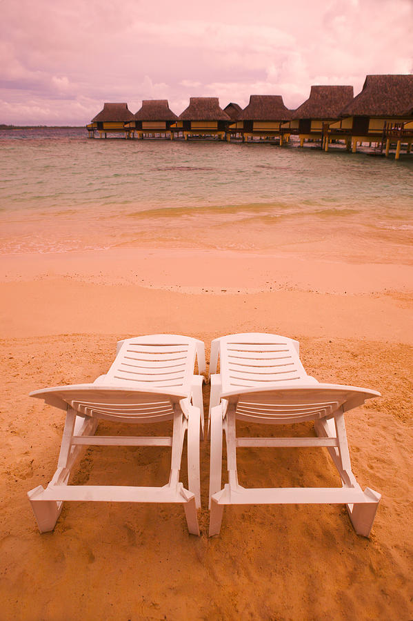 Landscape Photograph Of Two Empty Beach Chairs Overlooking A Beautiful Beach And Resort Photograph by Photodisc