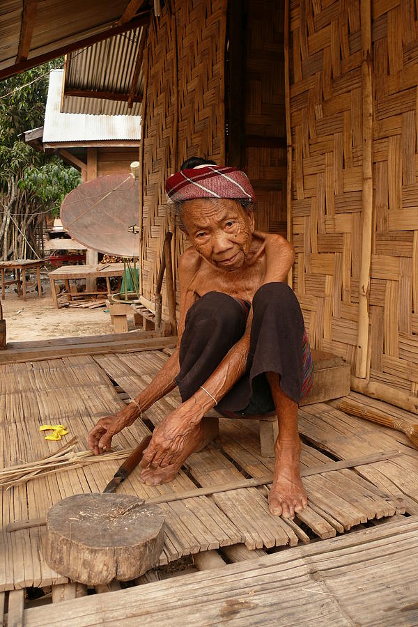 Lao woman with knife Photograph by Robert Bociaga
