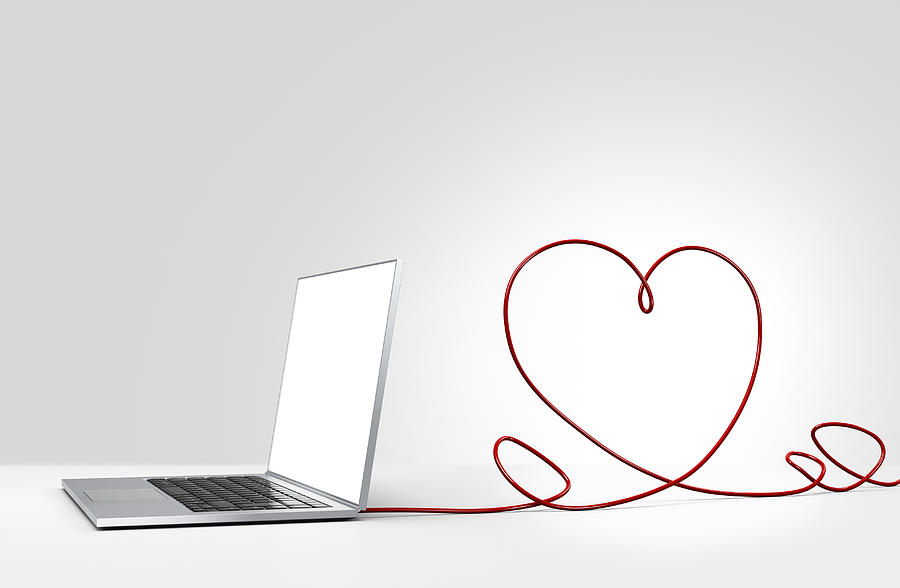 Laptop computer with cable forming a heart Photograph by I Like That One