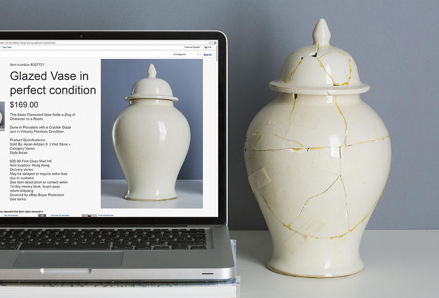 Laptop with advertised vase, beside broken one Photograph by Dimitri Otis
