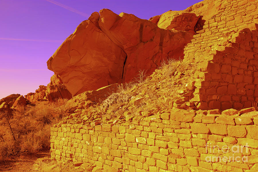 Large boulder next to adobe ruins Photograph by Jeff Swan