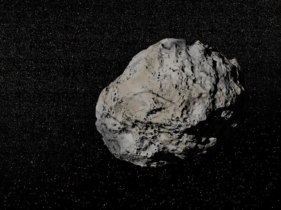 Large grey meteorite in the universe full of stars. Drawing by Elena Duvernay/Stocktrek Images