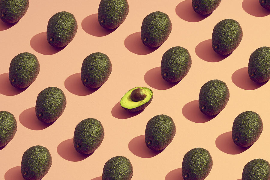 Large Group Of Avocados Placed In A Pattern Photograph by Daniel Grizelj