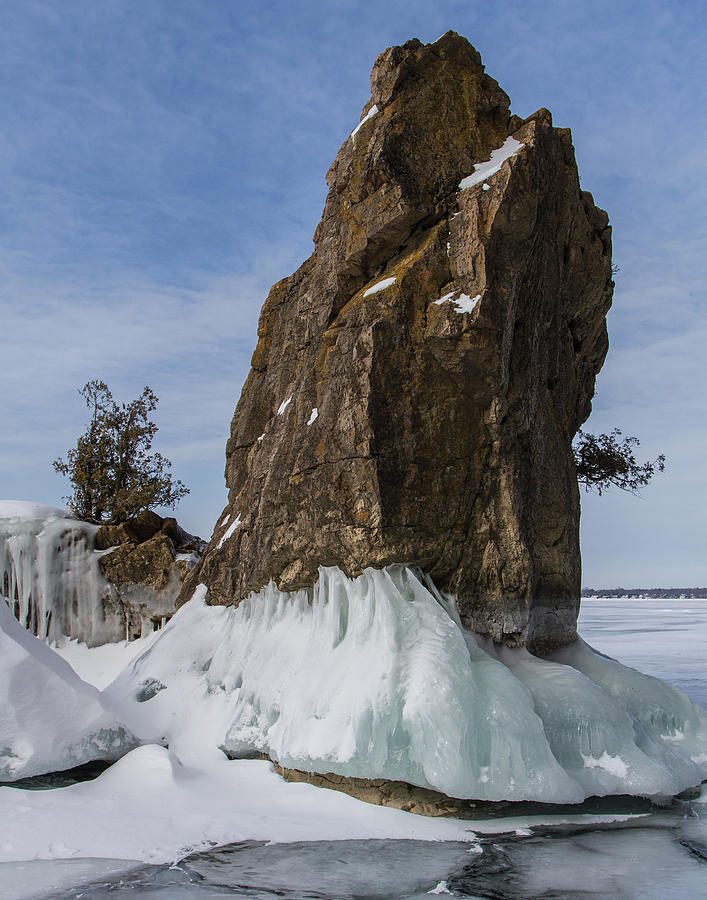 Large Rock Spire In Winter With Ice Formations On Lake Champlain In Burlington, Vermont Photograph