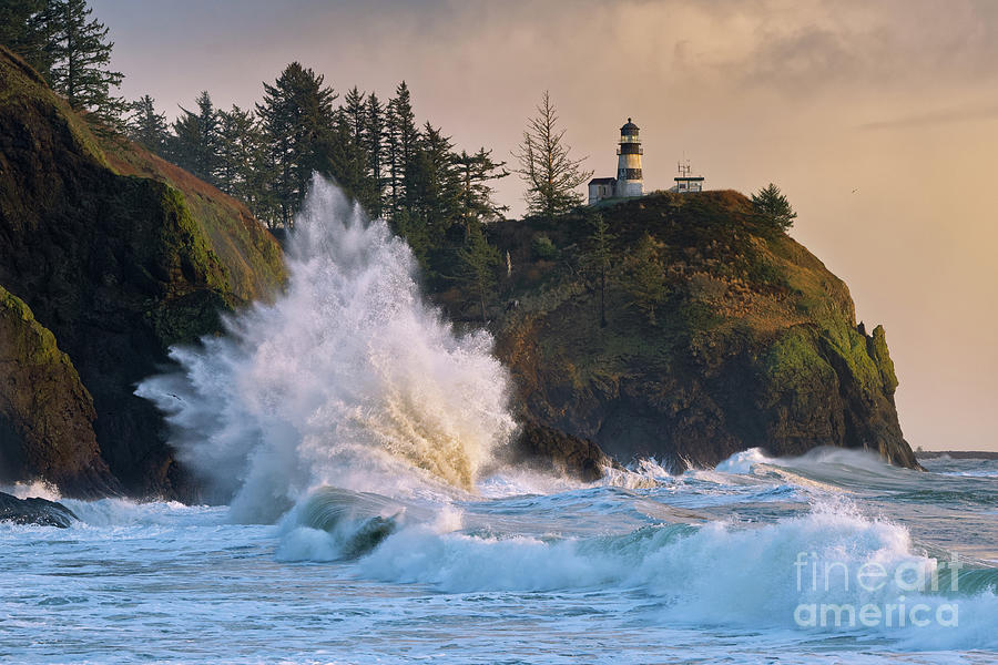 Large Wave  at Cape Disappointment Lighthouse in Washington Photograph by Tom Schwabel
