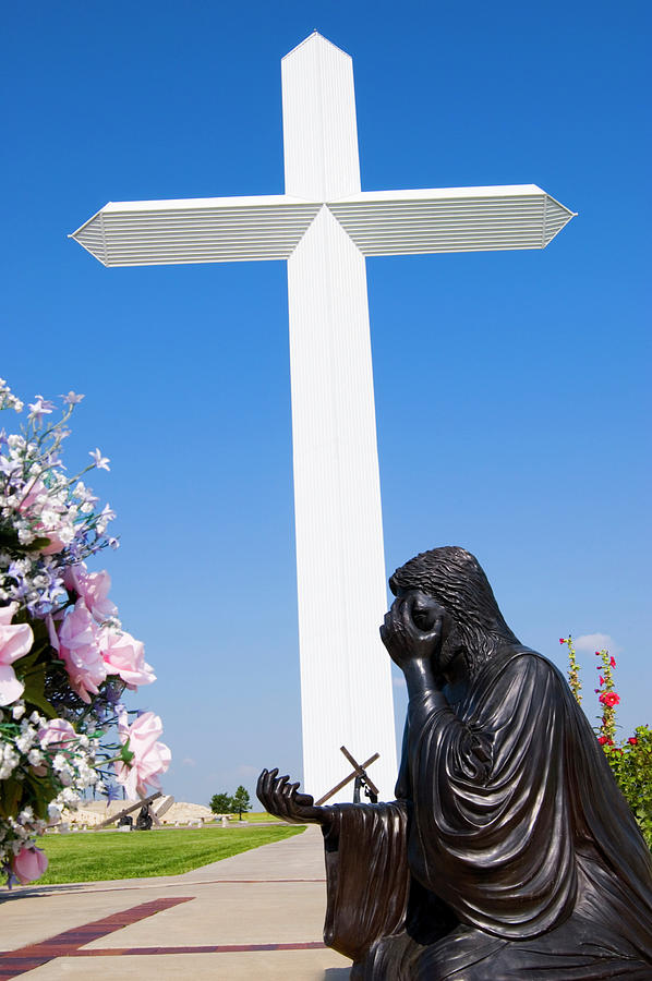 Largest Cross Groom Texas with flowers Photograph by Bob Pardue