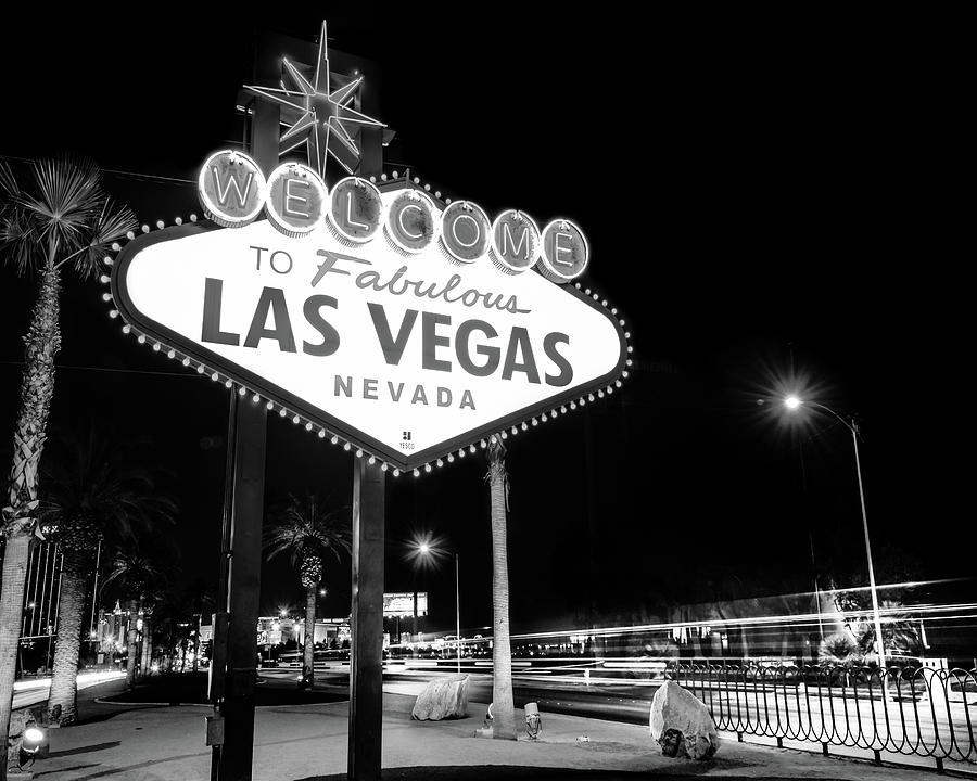 Black And White Photograph - Las Vegas Famous Welcome Sign in Black and White by Gregory Ballos