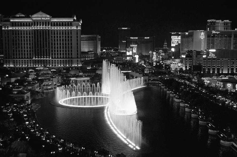 Las Vegas Neon Night Over Bellagio Fountains Black and White Photograph by Shawn OBrien