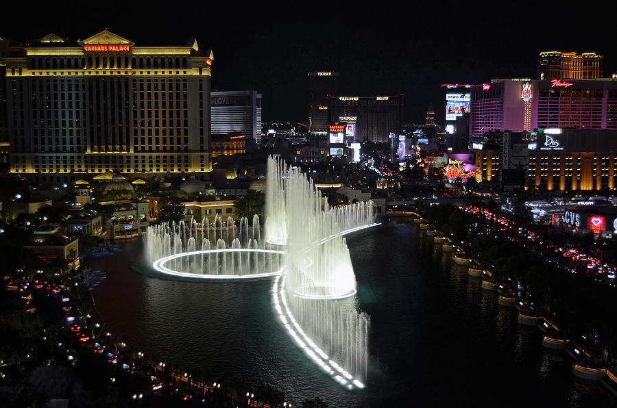 Las Vegas Neon Night Over Bellagio Fountains Photograph by Shawn OBrien