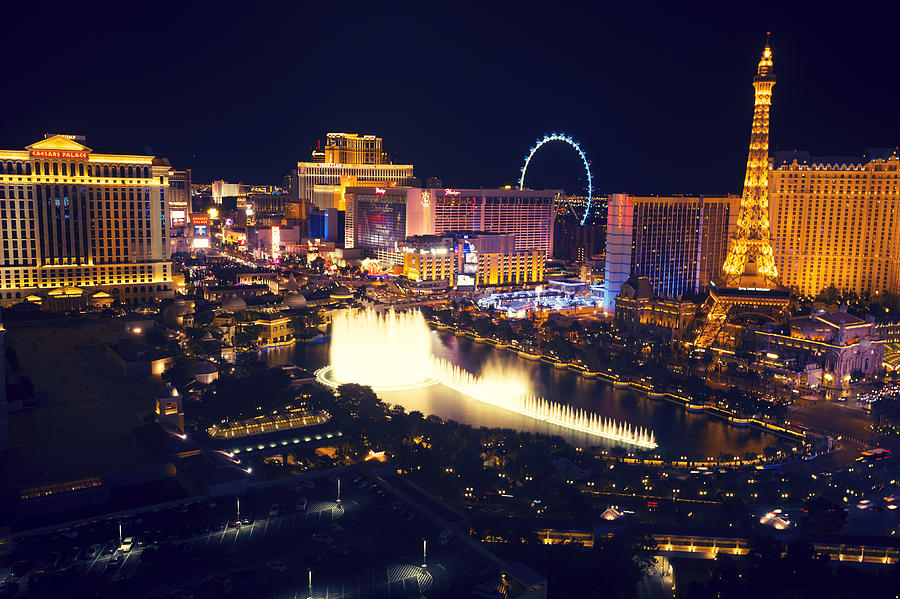 Las Vegas strip at night with Bellagio Fountain. Photograph by Courtneyk