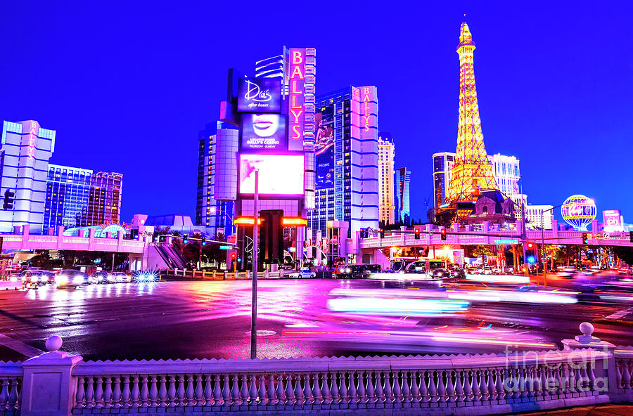 Las Vegas Strip Blues at Night Photograph by John Rizzuto