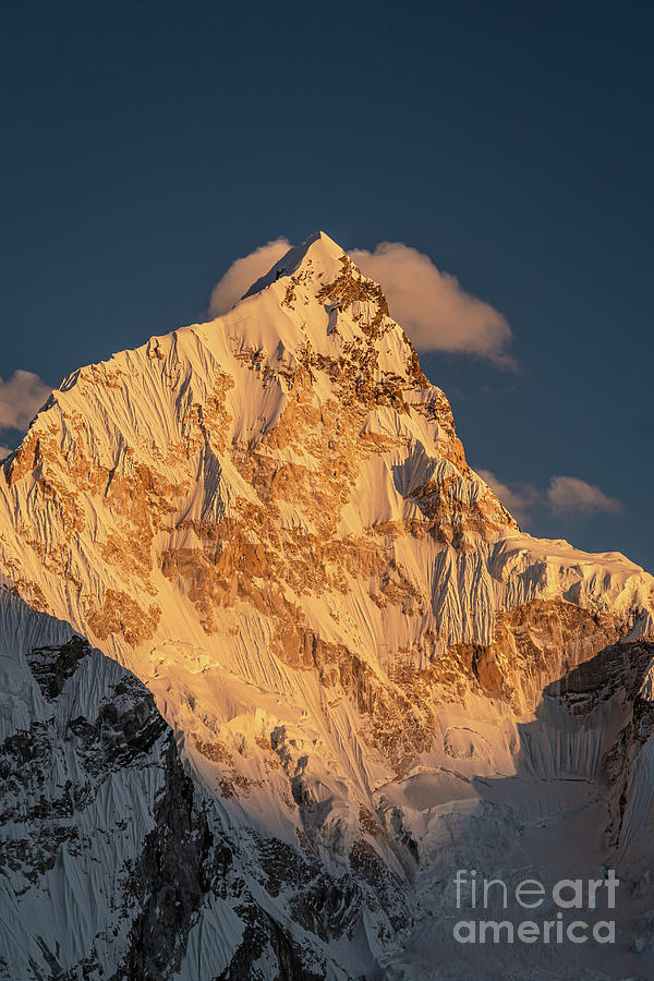 Last sunlight over the Nuptse peak from the Kala Patthar viewpoi Photograph by Didier Marti