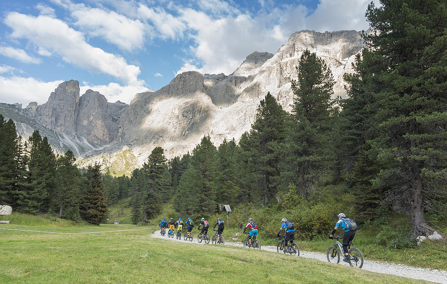 Late afternoon mountainbiking in Dolomite valley, Italy Photograph by Saro17