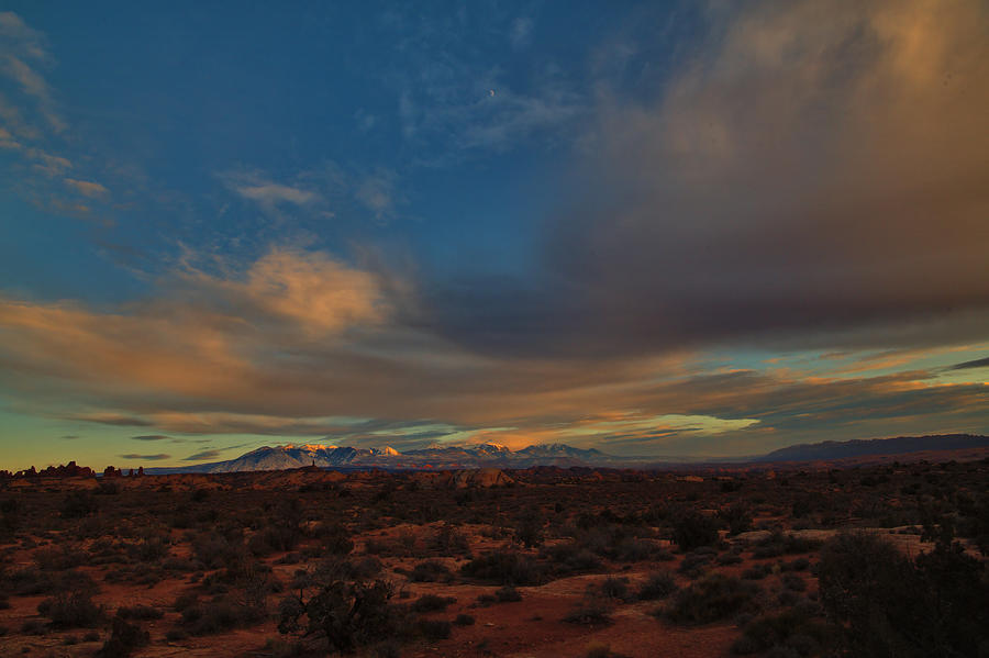 Late Day Light and Clouds, Arches National Park Photograph by Stephen Vecchiotti