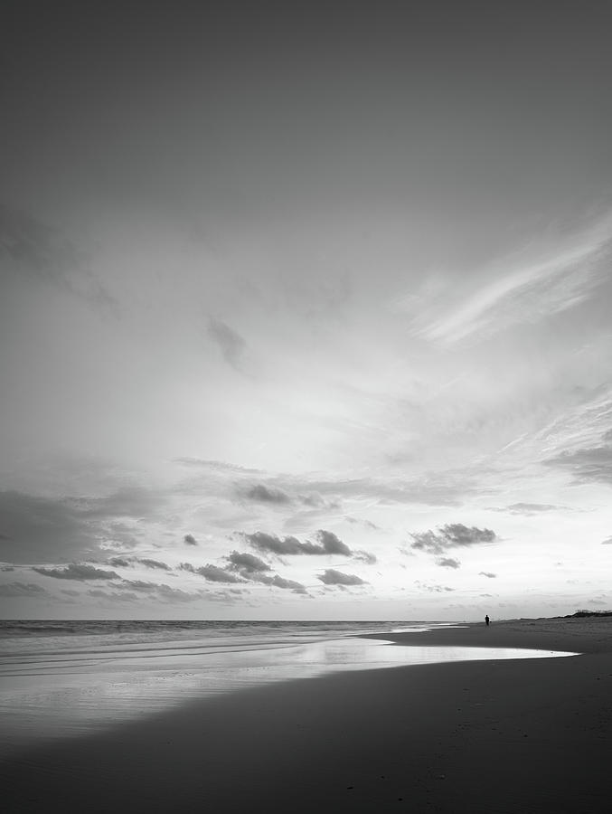 Late Evening Stroll On The Beach In Black And White Photograph