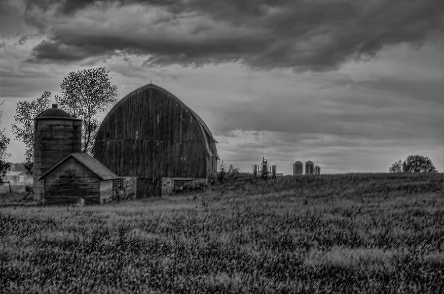 Late Spring Storm Over The Old Barn BW Photograph by Dale Kauzlaric