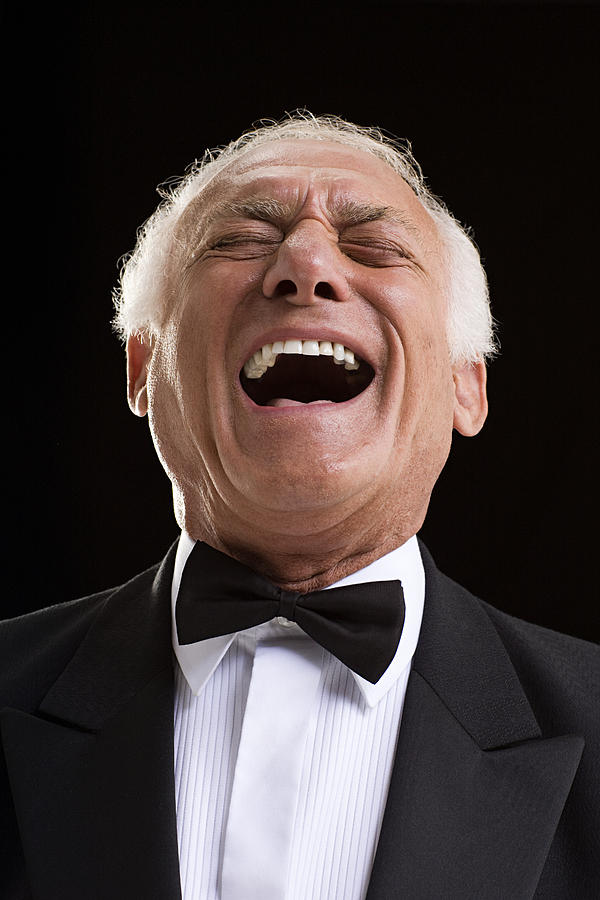 Laughing man in a dinner jacket Photograph by Image Source