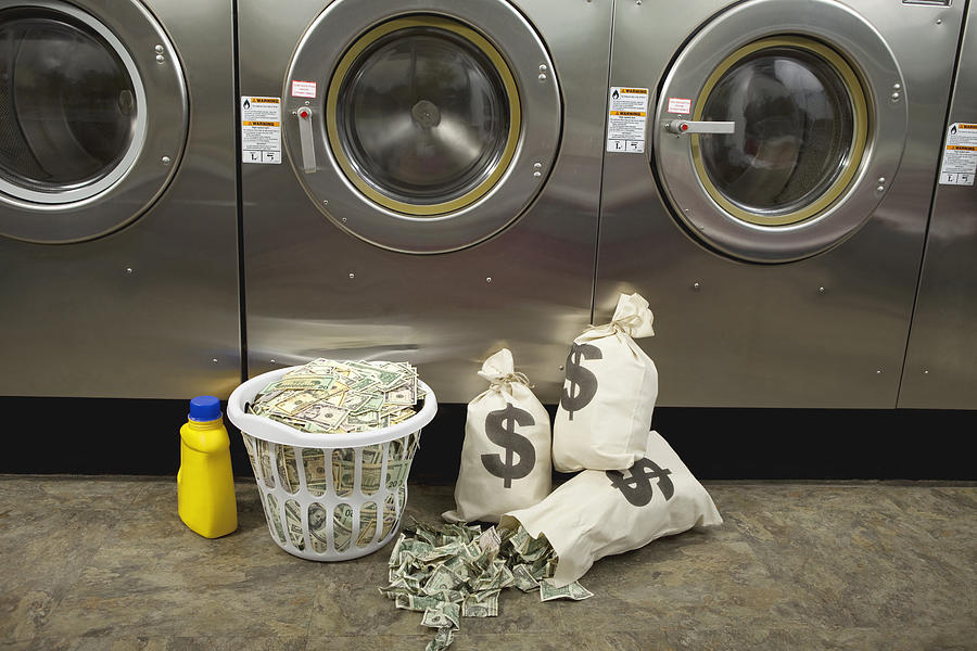 Laundering Money Photograph by Jtyler