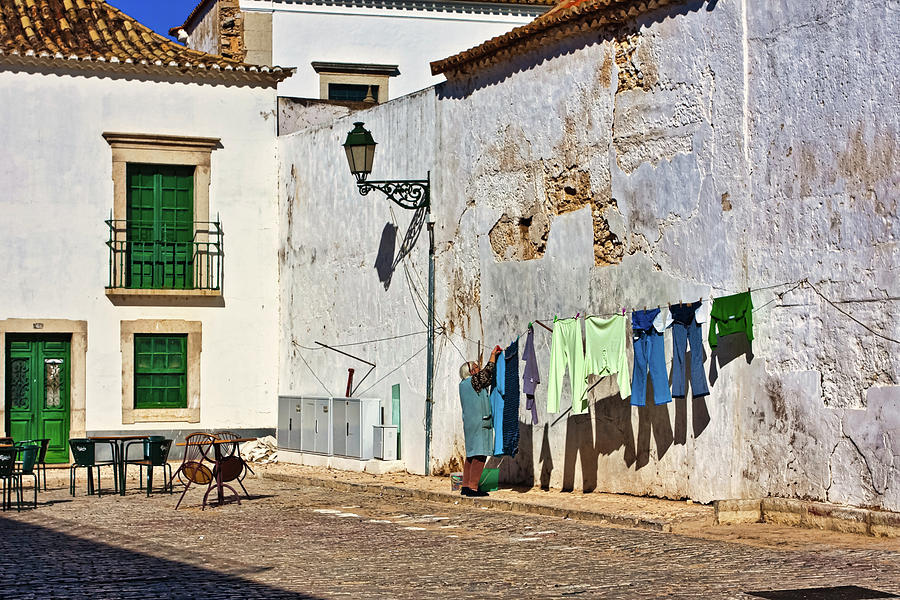 Laundry day in Faro Portugal Photograph by Tatiana Travelways