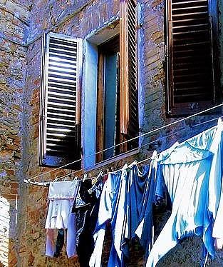 Laundry Drying in the Sun Photograph by Juliette Becker