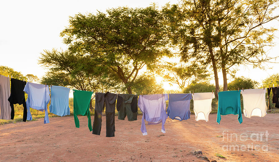 Laundry Drying on Outdoor Clothes Line Photograph by THP Creative