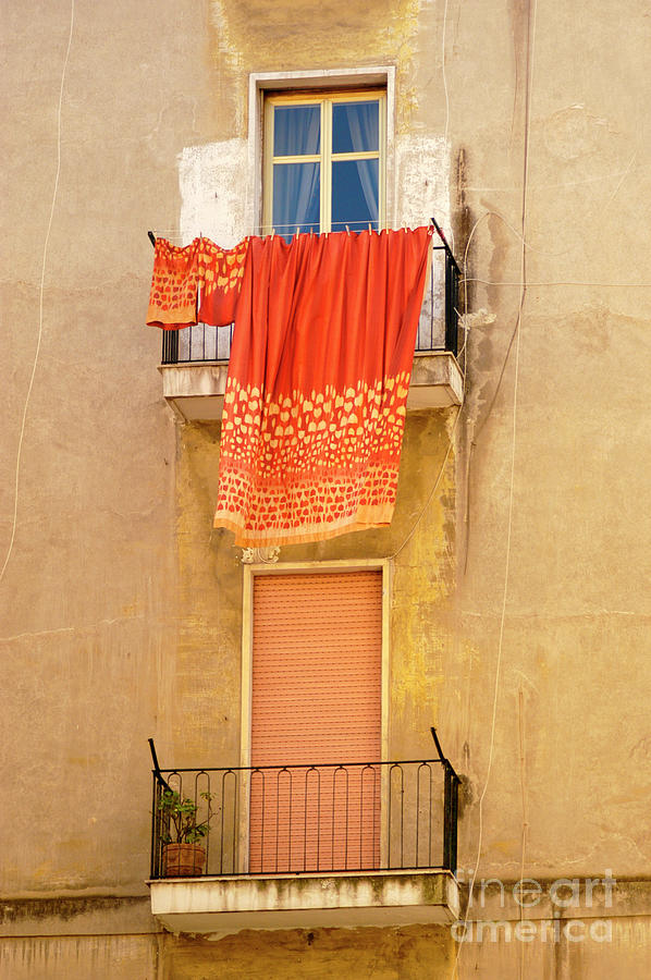 Laundry hanging on the streets of Naples, Italy Photograph by Gunther Allen