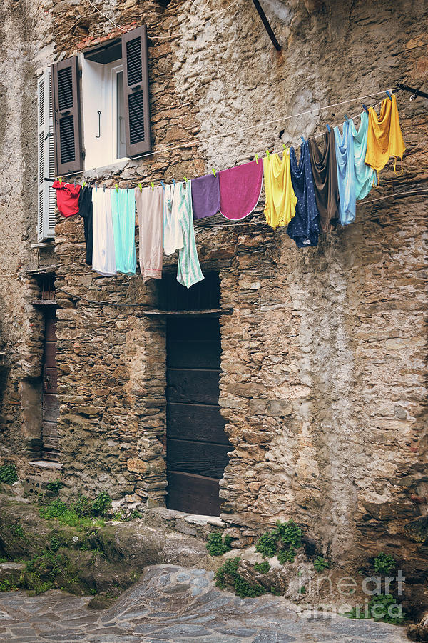 Laundry in Corsica Photograph by Delphimages Photo Creations