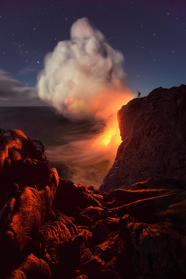 Lava flow falling into the ocean in Kalapana coast, Hawaii Photograph by Inigo Cia