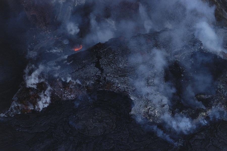Lava flows cover a desolate landscape, Big Island, Hawaii Photograph by Dex Image