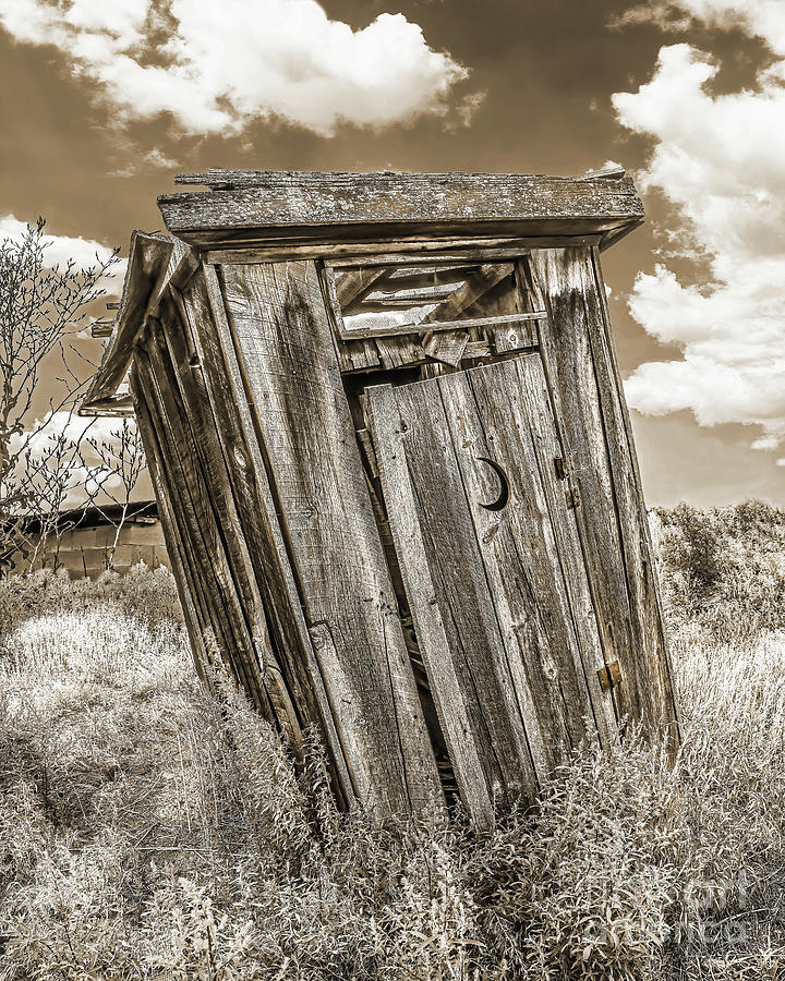 Leaning Outhouse, Sepia, New Mexico Photograph by Don Schimmel