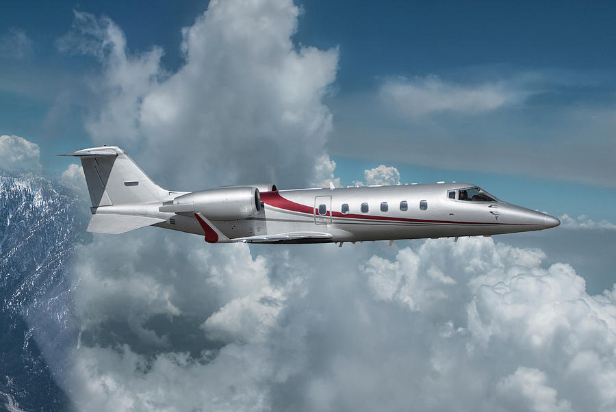 Learjet 60 In the Clouds Mixed Media by Erik Simonsen